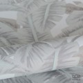 Biała tapeta z egzotycznymi liśćmi