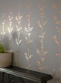 Szara fototapeta z miedzianym linearnym wzorem