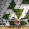 Fototapeta geometryczna w betonowo-liściaste trójkąty
