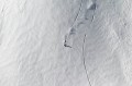 Fototapeta z motywem snowboardzisty jadącego po śniegu