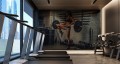 Fototapeta Wysportowana kobieta podnosząca sztangę