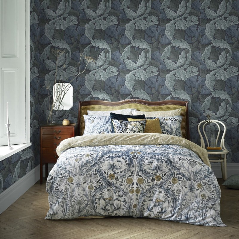 Niebieska tapeta na flizelinie z motywem liści