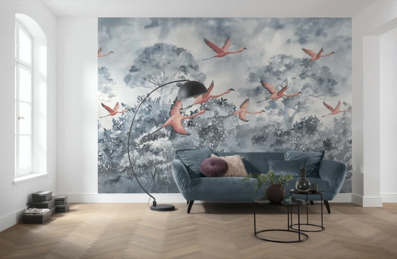 Fototapeta różowe flamingi lecące nad lasem
