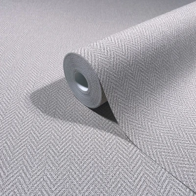 Szara tapeta w jodełkę z ozdobną strukturą