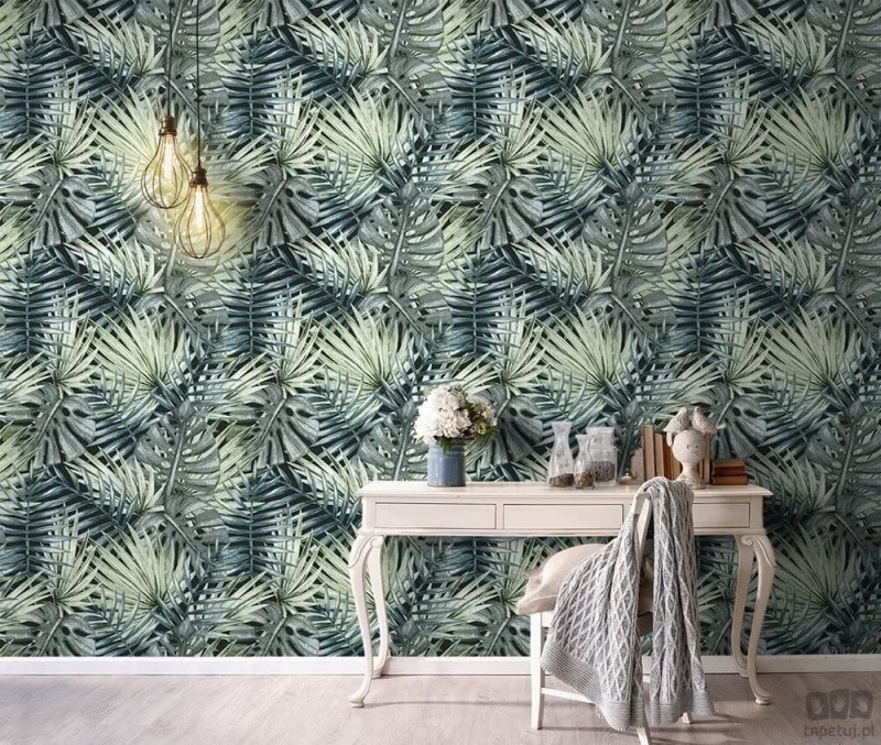 Zielona tapeta ICH Wallpaper Caribbean z motywem liści palm i monstery