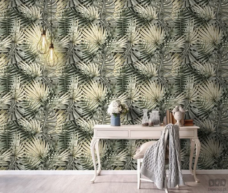 Zielono-czarna tapeta z ICH Wallpaper Caribbean motywem liści palm i monstery