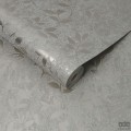 Szara tapeta z błyszczącymi ornamentami